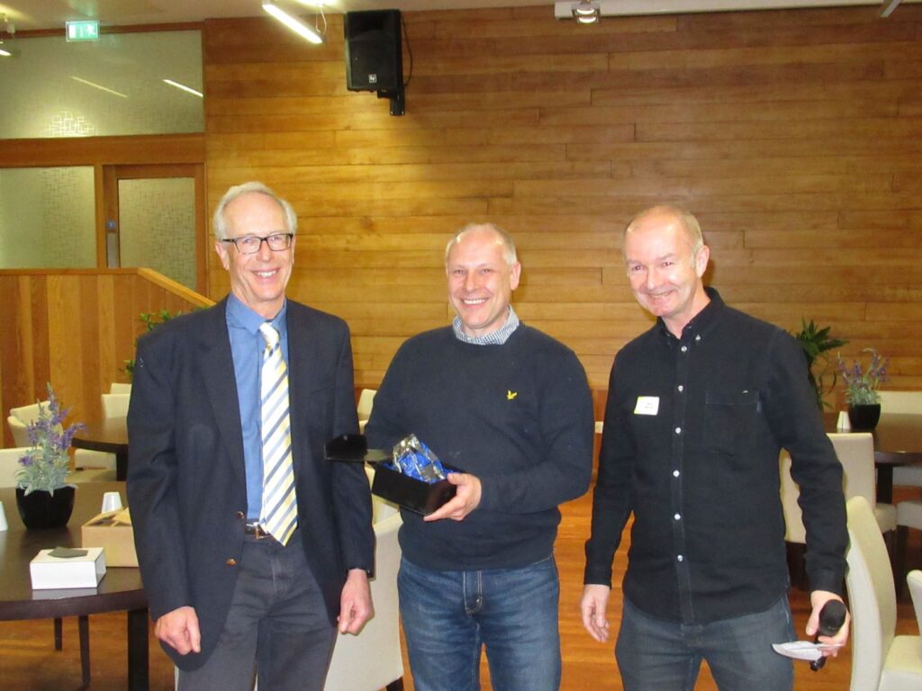 Stuart Wagstaff is presented with the Trevor Bridges Prize for best specimen collected on a Society field trip
